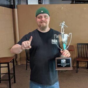 Greg holding one of his Tropheys